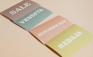 sale cards on beige background